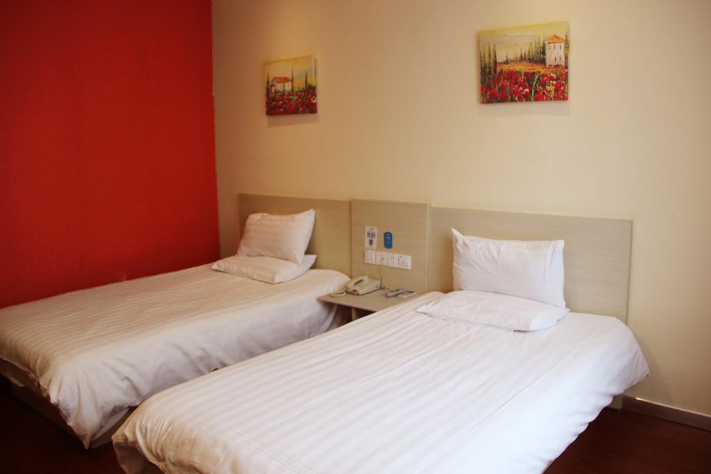 ฮั่นถิง โฮเทล ซินหยู นนเซียนไล้ Hotel Xinyu ห้อง รูปภาพ