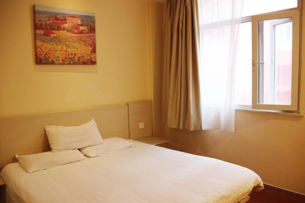 ฮั่นถิง โฮเทล ซินหยู นนเซียนไล้ Hotel Xinyu ภายนอก รูปภาพ
